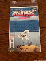 Front cover of Deadpool #37 comic sealed in bag