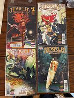 Front view of four Angela: Queen of Hel comic books issues 1-4 in sleeves