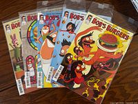 Front covers of five Bob's Burgers comics overlapping