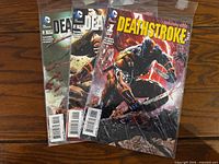 Front covers of three Deathstroke comics (#1-3) overlapped