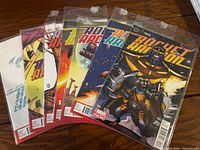 Front view of all seven bagged Rocket Raccoon comics