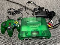 Console, controller, power adapter and AV cable laid out