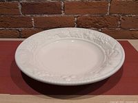 Top view showing full platter and embossed fruit border