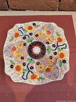 Front of Royal Staffordshire Cairo decorative plate showing full pattern