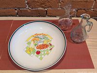 Bowl and two cruets overview