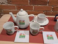 teapot, tulip cups, plain cup & saucer, tulip coasters
