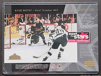 Front of Upper Deck jumbo card showing action shot, titles, hologram, plastic case