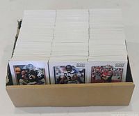 Open card box filled with tightly stacked 2018 Score football cards