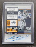 Front of 2010-11 Panini Playoff Contenders Anders Lindback rookie autograph card in plastic holder