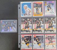 All ten Cam Neely cards, nine in binder page and one in holder