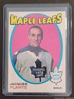 Front of Jacques Plante O-Pee-Chee card in plastic holder