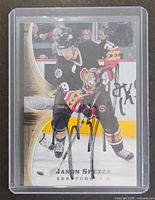 Front of Jason Spezza autographed Power Play card in holder