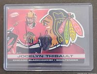 Front of autographed Jocelyn Thibault Pacific Atomic card in plastic sleeve