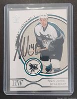 Front of Pacific Exhibit Jonathan Cheechoo card with autograph visible in holder