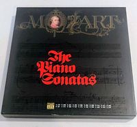 front of boxed set showing title, portrait, gold and red lettering