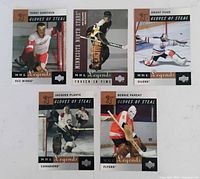 Front view showing all five goaltender cards laid out on white background
