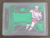 Front of Will Cuylle SPx Finite Rookies Green parallel card 188/199 in holder