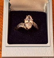 Ring in presentation box showing marquise stone and marcasite shoulders