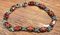 Bracelet laid flat showing stones, marcasite, clasp