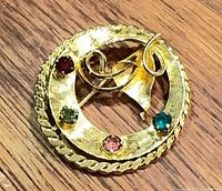 Front view showing design and coloured stones