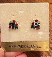 front view of earrings on D'Orlan card