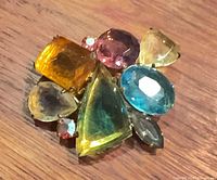 Front view showing full arrangement of multicolored stones