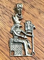 Front view of entire sterling silver Egyptian deity pendant showing design details and 925 stamp.