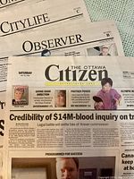 Front pages and section headers of both Ottawa Citizen editions