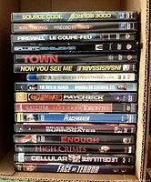 Full stack of 16 DVD cases showing titles