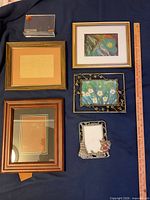 Group of five small frames showing materials and styles