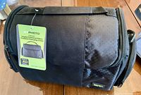 Front view of Xit Photo camera bag with retail tag attached