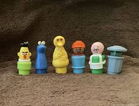 Group view of all six Sesame Street Little People figures