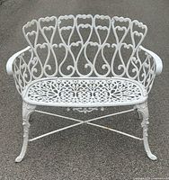 Front view of cast aluminum loveseat bench