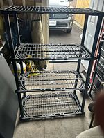 Full view of 4-tier Rubbermaid plastic shelving unit