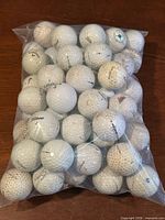 Full bag showing quantity of golf balls