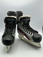 Front view of both skates showing laces, toes and tongue