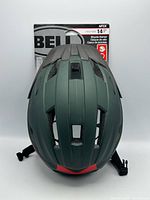 Front view of helmet with packaging visible