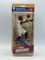 Front view of sealed Kyrie Irving action figure in blister packaging