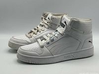 Side view of both shoes showing uppers, midsoles and Puma branding