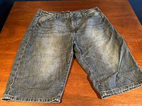 Full view of denim shorts front side