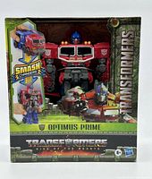 Front of sealed box showing Optimus Prime figure and Smash Changers branding