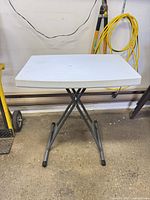 Full view of table standing