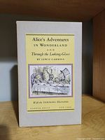 Front of slipcase showing title plate