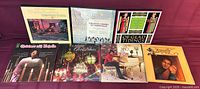 All eight Christmas LP jackets arranged for overview