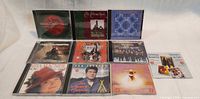 Front view showing 10 jewel case CDs and two Salvation Army booklets