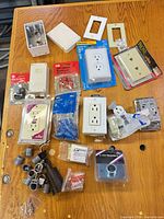 Overall view of all electrical items spread on table
