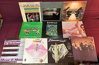 Front view of all ten album covers laid out