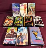 Front view of all 10 VHS tapes with slipcases