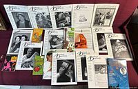 All magazines and songbooks spread on surface