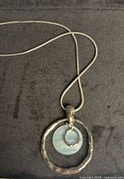 Full view of necklace with pendant and chain